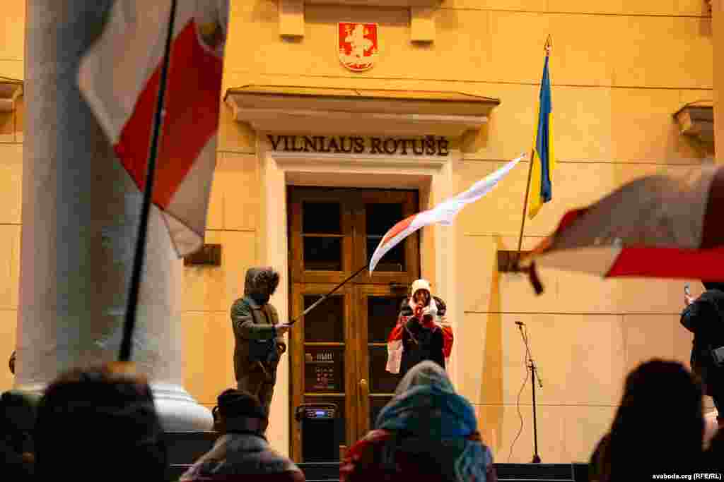 Poems by executed poets are read aloud in Vilnius as Belarusian exiles wave the white-red-white flag, which became a symbol of political activists after Belarus gained independence in 1991. The flag was replaced following a 1995 referendum but was then adopted by anti-government protesters in 2020-21 during demonstrations against&nbsp;authoritarian Belarusian leader Alyaksandr Lukashenka. Protesters who displayed the flag faced arrest in a violent crackdown.
