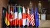 Сьцягі краін-удзельніц G7: Нямеччыны, Канады, Францыі, Італіі, Японіі, Вялікабрытаніі, ЗША і Эўразьвязу