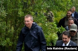 Rinkevics inspects the Latvia-Russia border near Lidumnieki in August.