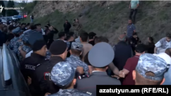 Armenia- Police clash with protesters near the Bagratashen boirder crossing, April 23, 2024.