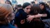 Жени се прегръщат по време на шествие за равни права и срещу насилието над жени на 8 март 2023 г. в София.