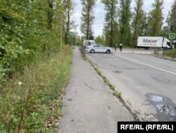 Police are stationed near the Pskov airport on August 30.