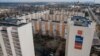Newly reconstructed apartment blocks in Mariupol
-- Residents, and even some workers, say the quality of the effort is questionable. 