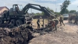 Ukrainian Military Clears Plane-Crash Debris