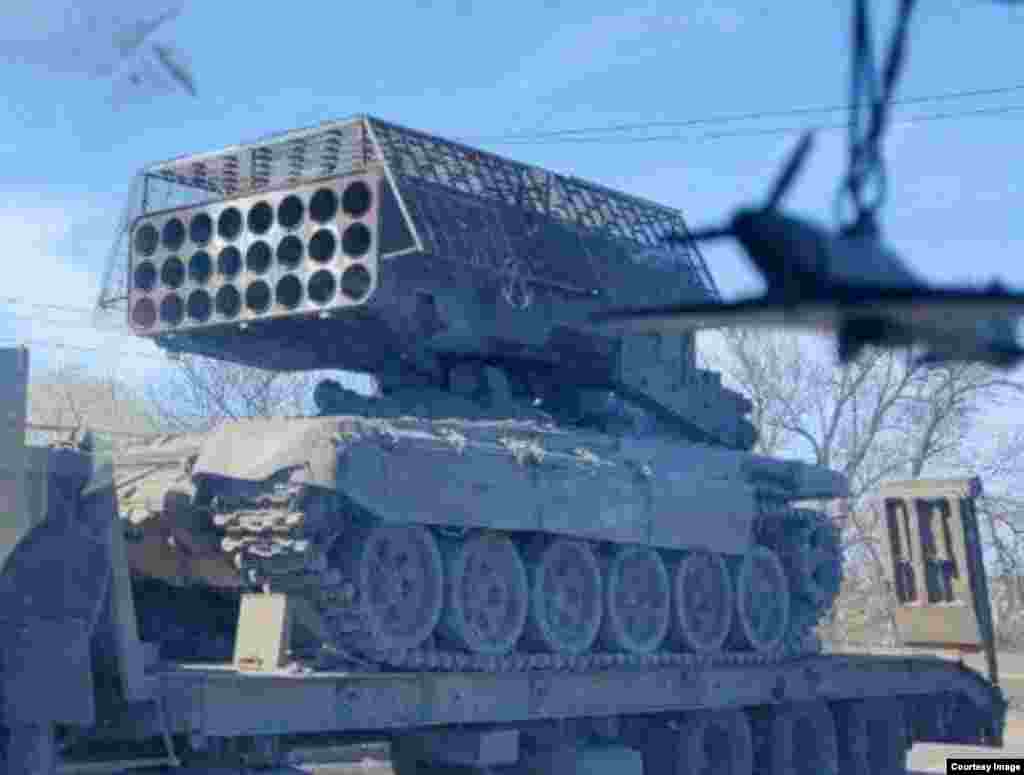 This photo showing a Russian TOS-1 Buratino multiple rocket launcher first appeared earlier this month and shows the &ldquo;heavy flamethrower&rdquo; weapon system fitted with a mesh screen. The screen is likely an attempt to protect the Buratino&rsquo;s rocket pod from Ukrainian-made suicide drones, which&nbsp;have emerged on the battlefield in recent weeks, as well as drone-dropped bomblets.