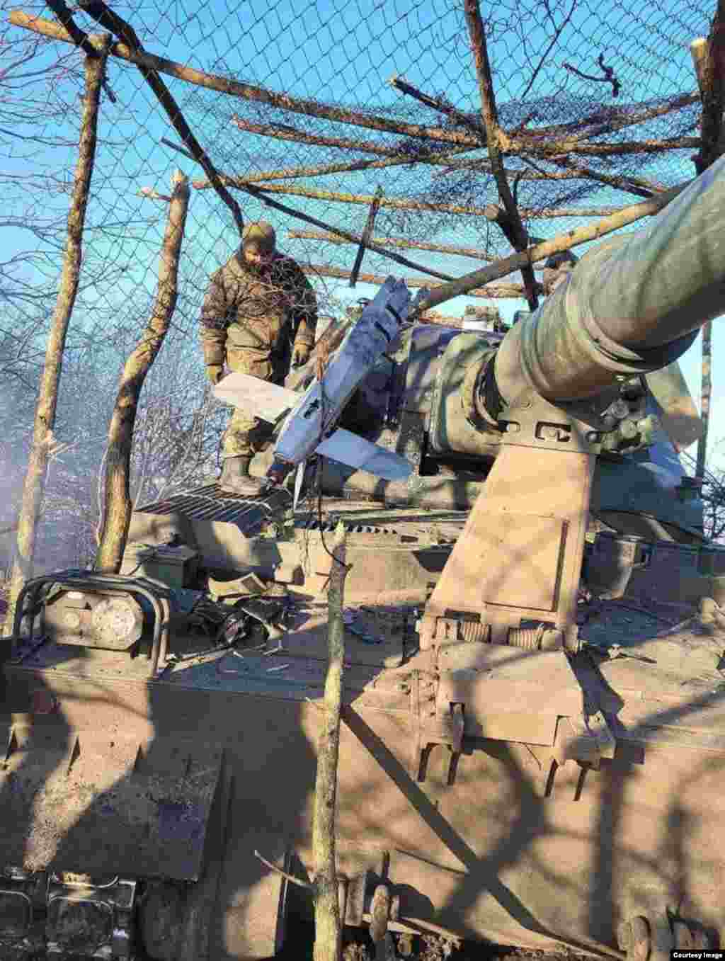 The cages have successfully foiled suicide drone attacks in some cases. This image shows the rear half of a Lancet that reportedly failed to detonate after slamming into makeshift protection around a Ukrainian Krab howitzer in January. &nbsp;