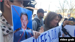 Protesters in Bishkek in April 2023 demand the resignation of the city's police chief, who had raised ire by blaming the victims in sexual violence cases.
