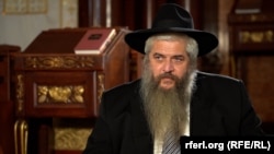 Rabbi Moshe Reuven Azman in conversation with RFE/RL's Ukrainian Service. 