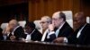 Predsjednik Međunarodnog suda pravde Nawaf Salam (u sredini) obraća se na početku ročišta u slučaju Nikaragva - Njemačka, u Hagu, Holandija, 8. aprila 2024.