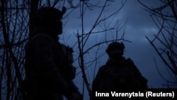 Ukrainian soldiers of 47th Brigade hold their positions at a front line near the town of Avdiivka, recently captured by Russian troops, in Ukraine's Donetsk region, on February 20.