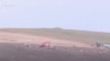 Armenia - Azerbaijani troops dig trenches outside Tegh village.