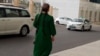 Turkmenistan. A schoolgirl walks in one of the streets of Ashgabat. May, 2024. girl, school