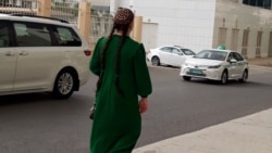 Turkmenistan. A schoolgirl walks in one of the streets of Ashgabat. May, 2024. girl, school