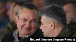 Președintele PSD și premier al României, Marcel Ciolacu (dreapta), și Nicolae Ciucă, liderul PNL și președintele Senatului