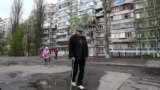 People are seen during an operation to evacuate some 3,000 people from 17 apartment buildings in Belgorod, Russia, over an explosive hazard on April 23. 