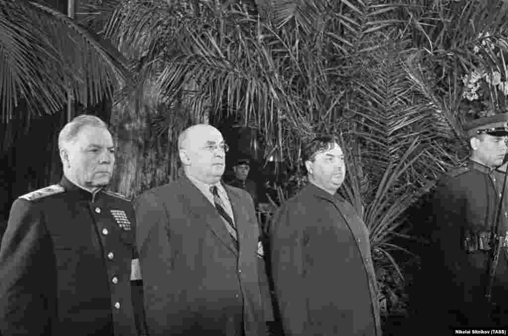 Senior Soviet communists (left to right) Kliment Voroshilov, Lavrenty Beria, and Georgy Malenkov stand in the guard of honor in front of Stalin&rsquo;s casket at the House of the Unions. Stalin had failed to name a successor, and in the uncertain period after his death a quiet power struggle raged within the Kremlin that would end with Beria&rsquo;s arrest and execution and Malenkov&rsquo;s demotion to manager of a hydroelectric plant in Far Eastern Soviet Kazakhstan. Voroshilov got off relatively lightly and died peacefully in 1969. &nbsp;