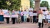 Demonstrators attend a rally against the torture of prisoner in Oskemen, East Kazakhstan region, on June 8.