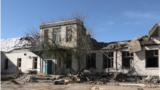 Разрушения в результате обстрела в городе Никополь.