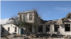 Разрушения в результате обстрела в городе Никополь
