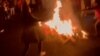 Iranian woman in Teheran burning scarfs, footage from social media