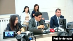 Armenia - Yeghishe Kirakosian (center) speaks at a parliament committe meeting in Yerevan, September 28, 2023.