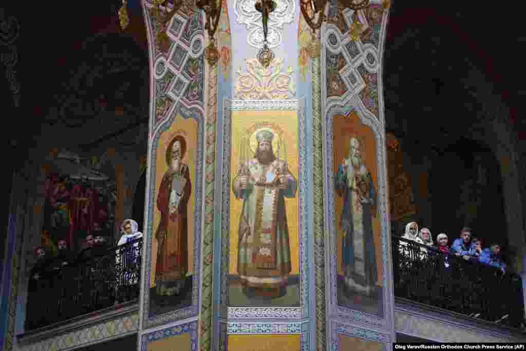 Parishioners attend a liturgy by Patriarch Kirill, head of the Russian Orthodox Church, at the Transfiguration of the Savior Cathedral in Valaam, Russia.&nbsp;