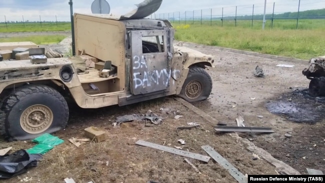 Russia -- Burned armored vehicles of a Ukrainian sabotage and reconnaissance group