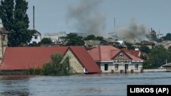 კახოვკის ჰესის ნგრევის შედეგად ქალაქ ხერსონში დატბორილი უბანი. 2023 წლის 8 ივნისი