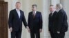 Romanian President Klaus Iohannis (left) meets with PSD, PNL, and minorities representatives at Cotroceni Pallace in Bucharest on June 13. 