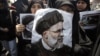 A portrait of Iranian President Ebrahim Raisi during his funeral on May 22