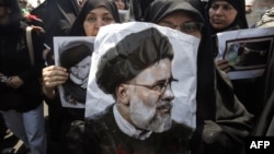 A portrait of Iranian President Ebrahim Raisi during his funeral on May 22