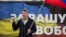 Boris Nemtsov, a former Russian deputy prime minister and opposition leader addresses demonstrators during a massive rally to oppose president Vladimir Putin's policies in Ukraine, in Moscow, Saturday, March 15, 2014.