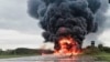 Российский военный самолёт горит на авиабазе Сольцы в Новгородской области после атаки беспилотника. Август 2023 года