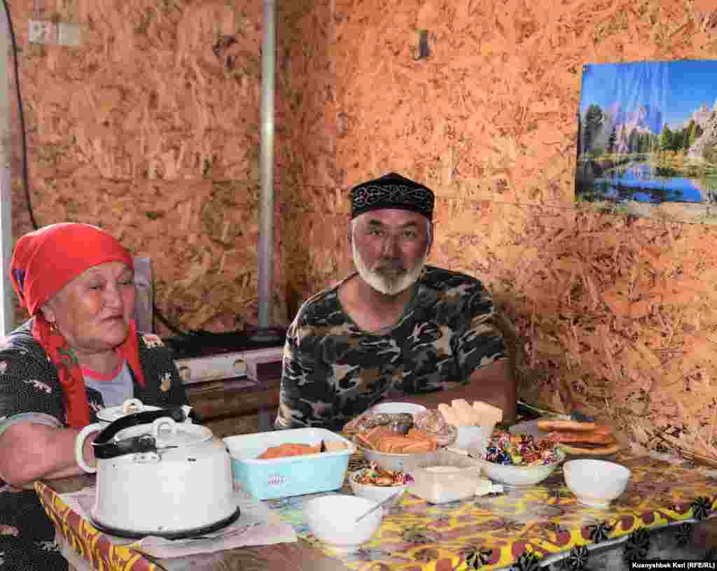 Farmer Tolesh sits at his dinner table at home. Thousands live near the borders of the test sites. Many live on contaminated land and struggle with illnesses that doctors say are linked to the test site&#39;s contamination. Residents receive government benefits for living in the contaminated area, but complain the benefits are hardly enough to allow them to make ends meet.