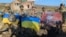 A handout photograph released by Kyiv shows Ukrainian soldiers posing with Ukrainian national flags in front of a destroyed building in the village of Klishchiyivka on September 17.<br />
<br />
President Volodymyr Zelenskiy announced that Ukrainian forces had liberated Klishchiyivka, a village on the southern flank of Bakhmut. The announcement came two days after Ukraine's military said it had gained control of a small nearby village, Andriyivka, about 10 kilometers southwest of Bakhmut.<br />
<br />
&nbsp;