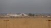 Изглед към военната база Калсо в Ирак, след като беше засегната от мощна експлозия късно на 19 април.