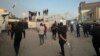 معترضان در بغداد از دیوار سفارت سوئد بالا رفتند