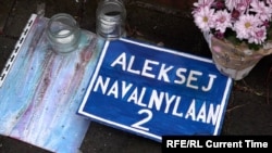 A sign left outside the Russian Embassy in The Hague