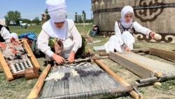 Kyrgyzstan. Batken. Carpet. Women. Festival.