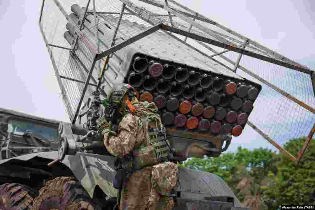 A Russian Grad multiple-rocket launcher fitted with wire netting to prevent FPV drones from detonating directly against the launch tube bank. The photo was taken in eastern Ukraine in June. &nbsp;