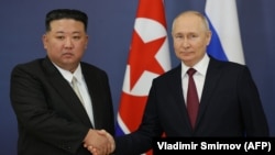 Лидер Северной Кореи Ким Чен Ын и президент России Владимир Путин