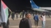 Protesters storm the runway of the airport in Makhachkala as a flight arrives from Israel late on October 29. 