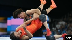 Айсулуу Тыныбекова жана Орхон Пуревдорж Париж Олимпиадасында. 11-август, 2024-ж. 