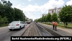 The same Bucha street during roadworks in May 2023