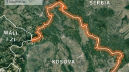 Policë të Kosovës duke patrulluar pranë fshatit Bare, në veri të Kosovës më 14 qershor 2023.