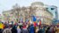 Waving Moldovan flags at a rally organized by the Kremlin-friendly Shor Party on February 28 in Chisinau, the crowd called for the country's new pro-Western government "not to involve the country in war." 