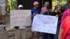 Sarajevo, Bosnia and Herzegovina -- Two protesters from Associations of myeloma patients in front of the local parliament