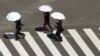 Pješaci u Tokiju, Japan, 4. avgusta 2023.