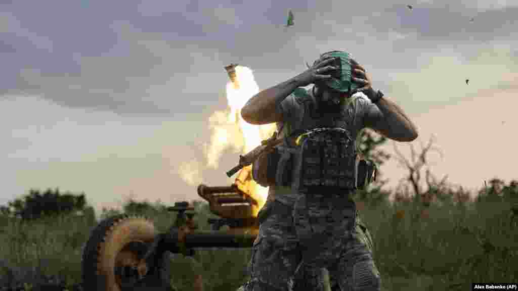 A Ukrainian soldier of the 3rd Separate Assault Brigade fires a 122-millimeter mortar toward Russian positions at the front line near Bakhmut on July 2. Ukrainians troops have captured territory from Russian forces around Bakhmut in the east and along the southern front in the last week, Ukrainian Deputy Defense Minister Hanna Malyar said on Telegram on July 3.