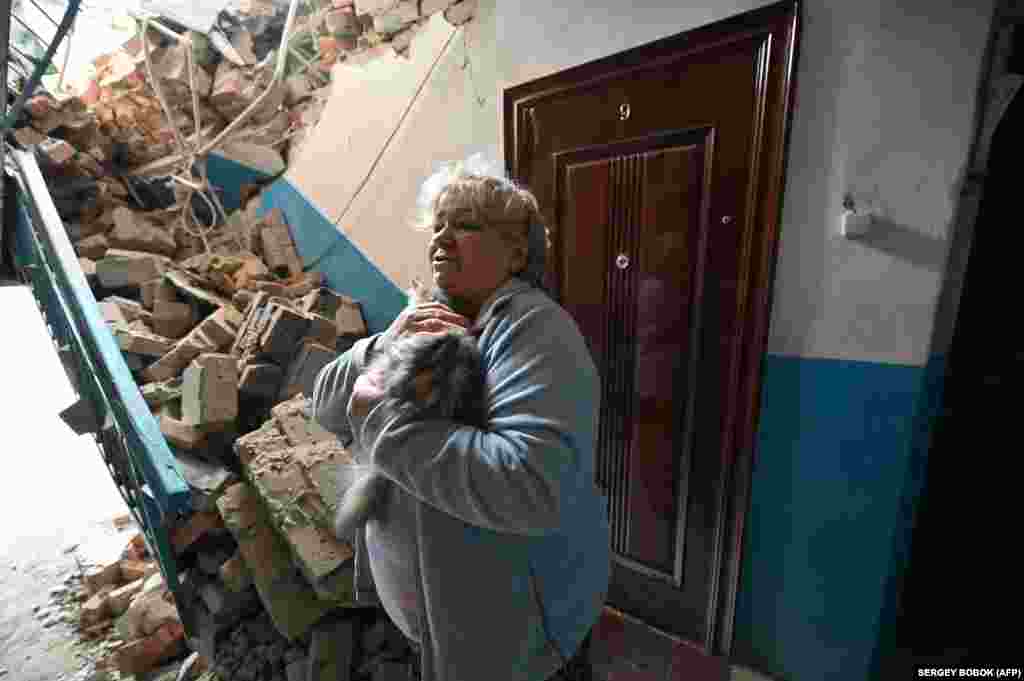 Tamara Skliarova, a 70-year-old resident, has remained in the city throughout. Her building was shelled and the stairs to the upper story are now blocked by debris.